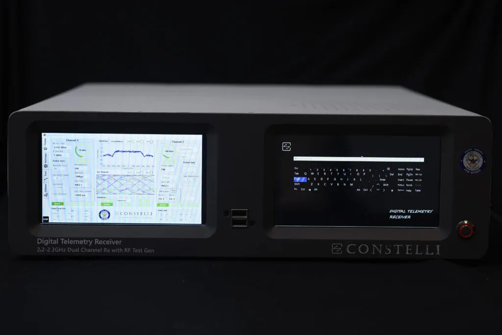 The digital telemetry receiver's front-panel screens, one showing per-channel settings beside spectrum, constellation and eye-diagram plots, the other an on-screen keyboard